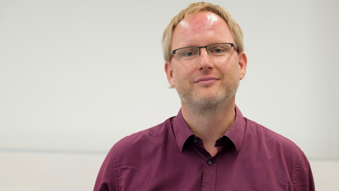 Michael Rydryck schaut in die Kamera.